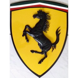 Metal shield with Ferrari logo
